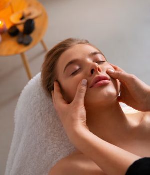 female-masseur-giving-back-massage-client_23-2150461452